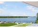 Stunning view of the waterway, lush greenery and docks at 2375 N Beach Rd # 3B, Englewood, FL 34223