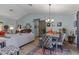 Dining area with stylish chairs and an inviting atmosphere with a view of the living room at 6367 Facet Ln, Port Charlotte, FL 33981