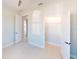 Bright bedroom with a view into the closet and the rest of the house at 721 Redbud Ct, Englewood, FL 34223