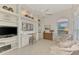 Home office with built in shelving and seating area at 3413 Pennyroyal Rd, Port Charlotte, FL 33953