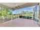 Spacious screened-in porch overlooking a lake at 3413 Pennyroyal Rd, Port Charlotte, FL 33953