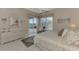 Bright bedroom with sliding door to patio access at 3413 Pennyroyal Rd, Port Charlotte, FL 33953