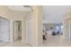 Hallway view of home's interior and additional rooms at 3413 Pennyroyal Rd, Port Charlotte, FL 33953