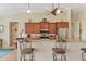 Modern kitchen with stainless steel appliances and granite countertops at 15608 Lakeland Cir, Port Charlotte, FL 33981