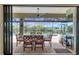 Enjoy dining al fresco overlooking the pool and canal at 15608 Lakeland Cir, Port Charlotte, FL 33981