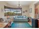 Cozy sitting area with comfortable sofa and view of the water at 15608 Lakeland Cir, Port Charlotte, FL 33981