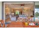 View of living room and canal from patio at 15608 Lakeland Cir, Port Charlotte, FL 33981