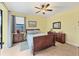 Charming bedroom with a queen-size bed and built-in storage at 15608 Lakeland Cir, Port Charlotte, FL 33981