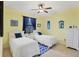 Cozy bedroom with twin beds, ideal for guests at 15608 Lakeland Cir, Port Charlotte, FL 33981