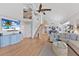 Spacious living room with high ceilings, hardwood floors, and a loft at 11000 Placida Rd # 2303, Placida, FL 33946