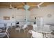 Community kitchen with tables and chairs for gatherings at 11000 Placida Rd # 2303, Placida, FL 33946