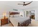 Main bedroom with king bed and private balcony access at 11000 Placida Rd # 2303, Placida, FL 33946