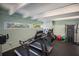 Well-equipped fitness center featuring treadmills, elliptical machines, and weight training equipment at 11000 Placida Rd # 2303, Placida, FL 33946