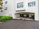 Covered parking garage with parking spaces at 11160 Hacienda Del Mar Blvd # D-205, Placida, FL 33946