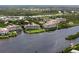 Aerial view of condo building near the water at 11160 Hacienda Del Mar Blvd # D-205, Placida, FL 33946