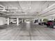 View down a long covered parking garage at 11160 Hacienda Del Mar Blvd # D-205, Placida, FL 33946
