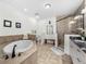 Spa-like bathroom with soaking tub, walk-in shower, and double vanity at 11160 Hacienda Del Mar Blvd # D-205, Placida, FL 33946