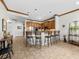 Eat-in kitchen with island seating and wood cabinets at 11160 Hacienda Del Mar Blvd # D-205, Placida, FL 33946