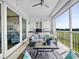 Outdoor patio with seating area, wet bar, and river views at 11160 Hacienda Del Mar Blvd # D-205, Placida, FL 33946