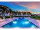 Resort-style community pool with plenty of lounge chairs at 11160 Hacienda Del Mar Blvd # D-205, Placida, FL 33946