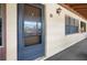 Condo building exterior showcasing a unit's entrance at 8 Quails Run Blvd # 10, Englewood, FL 34223