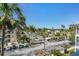 Aerial view of community with parking, landscaping, and resort-style amenities at 8413 Placida Rd # 407, Placida, FL 33946