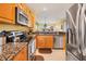 Modern kitchen with stainless steel appliances and granite countertops at 8413 Placida Rd # 407, Placida, FL 33946