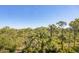 Enjoy the peaceful, wooded landscape surrounding this property at 8413 Placida Rd # 407, Placida, FL 33946