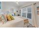 Guest bedroom with full-size bed and colorful decor at 8413 Placida Rd # 407, Placida, FL 33946