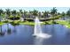 Water fountain in a pond near community clubhouse at 8413 Placida Rd # 407, Placida, FL 33946