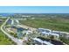 Aerial view showcasing the community's location, amenities, and landscaping at 8413 Placida Rd # 407, Placida, FL 33946