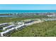 Aerial view of community, showcasing coastal location and resort amenities at 8413 Placida Rd # 407, Placida, FL 33946