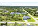 Aerial view of property with surrounding homes at 8374 Agate St, Port Charlotte, FL 33981