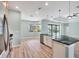Spacious kitchen with an island, stainless steel appliances, and light cabinetry at 8374 Agate St, Port Charlotte, FL 33981