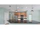 Modern kitchen featuring stainless steel appliances and a large island at 8374 Agate St, Port Charlotte, FL 33981