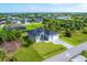 Aerial view of the house and surrounding neighborhood at 15715 Viscount Cir, Port Charlotte, FL 33981