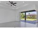 Bright living room with sliding glass doors leading to the backyard at 15715 Viscount Cir, Port Charlotte, FL 33981