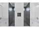 Modern bathroom with double vanity and walk-in showers at 15715 Viscount Cir, Port Charlotte, FL 33981