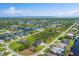 Aerial view of waterfront homes and community at 15715 Viscount Cir, Port Charlotte, FL 33981