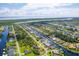 Aerial view of waterfront community with many houses and canals at 15715 Viscount Cir, Port Charlotte, FL 33981