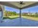 Spacious covered patio overlooking the backyard at 15715 Viscount Cir, Port Charlotte, FL 33981