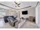Spacious living area with recessed lighting and large TV at 249 Rotonda Cir, Rotonda West, FL 33947