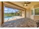 Covered patio overlooking a refreshing pool and spa, perfect for outdoor enjoyment at 249 Rotonda Cir, Rotonda West, FL 33947