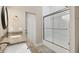 Bathroom with granite countertops, double sinks, and a large shower at 249 Rotonda Cir, Rotonda West, FL 33947