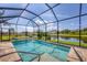 Enjoy the refreshing pool and spa, screened for your comfort and privacy at 249 Rotonda Cir, Rotonda West, FL 33947