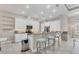 Modern kitchen with white cabinets and granite countertops at 249 Rotonda Cir, Rotonda West, FL 33947