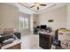 Home office with built-in shelving and large window at 249 Rotonda Cir, Rotonda West, FL 33947
