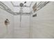Large walk-in shower with modern tile and fixtures at 249 Rotonda Cir, Rotonda West, FL 33947