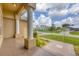 Covered front porch with view of the neighborhood at 249 Rotonda Cir, Rotonda West, FL 33947