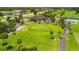 Aerial view of a lush green golf course at 249 Rotonda Cir, Rotonda West, FL 33947